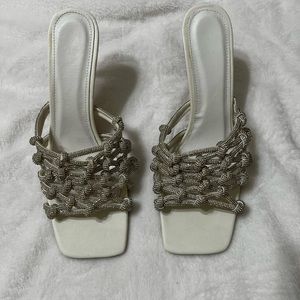 Women’s size 13 clear heel with silver details - never worn.